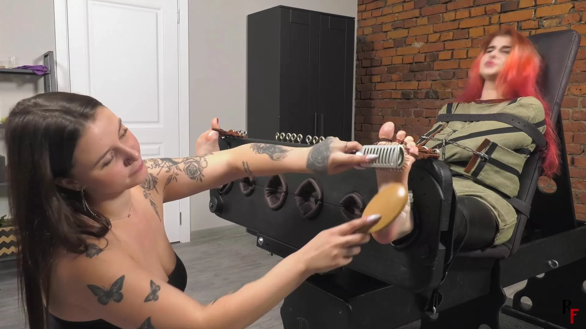 RFStudioProduction – Liza Lush plays with feet of stocked Pandora in a straitja.webp