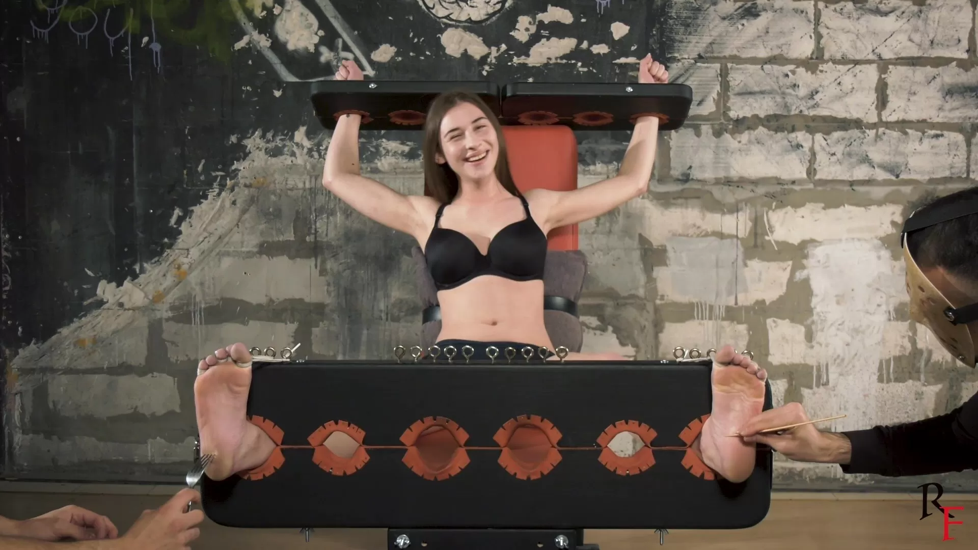 RussianFetish - Tickling hell for Bria in stocks or story how we tease 18 yo bea.webp