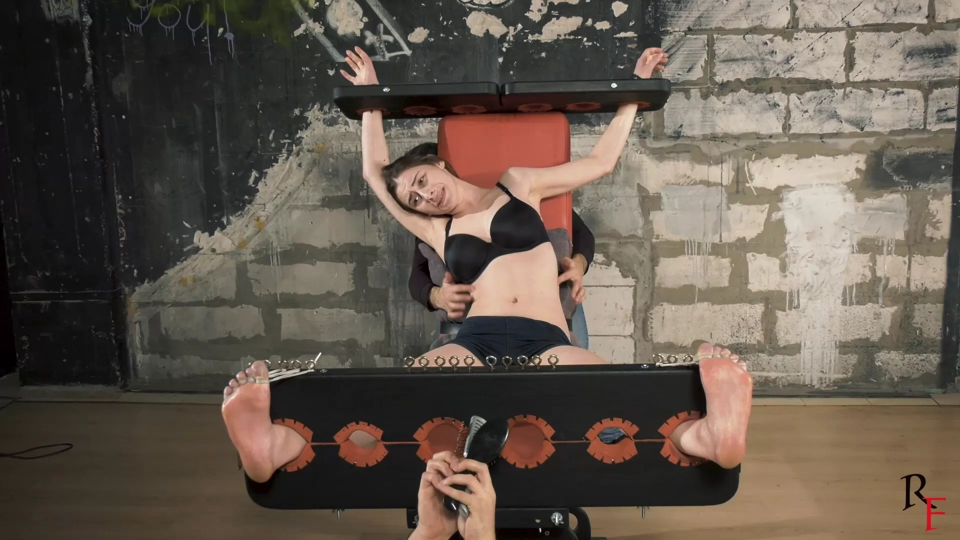 RussianFetish - Tickling hell for Bria in stocks or story how we tease 18 yo bea.webp
