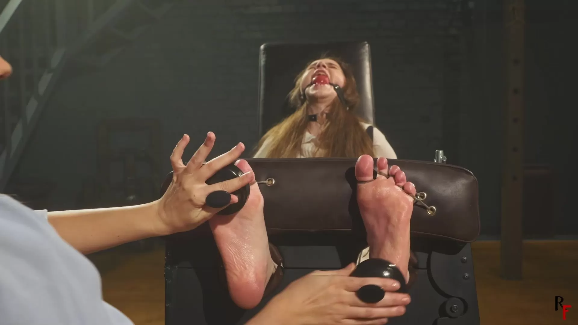 RFStudioProduction – Arina – Foot Tickled by Patty in Stocks with BallGag, Tie.webp