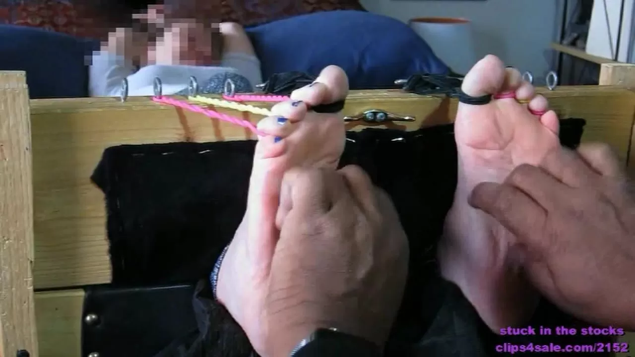 StuckInTheStocks - Samantha and her tiny feet get tickled until she shrieks!.000.webp