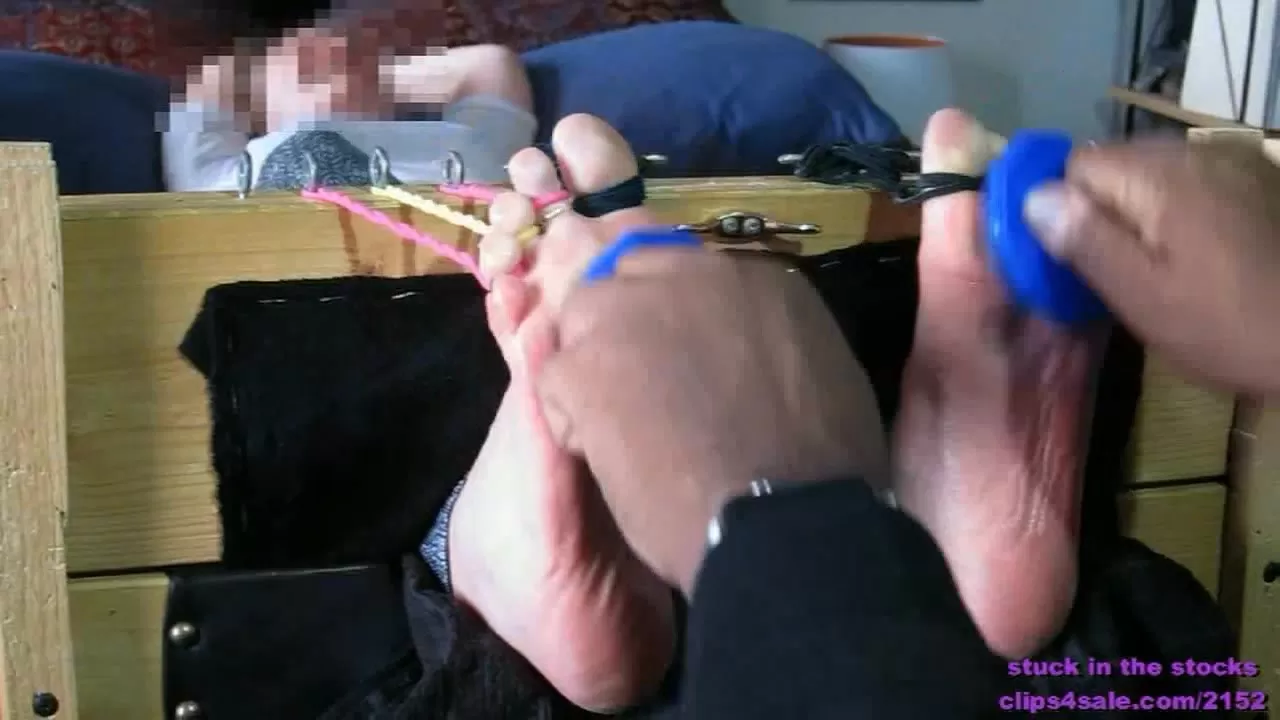 StuckInTheStocks - Samantha and her tiny feet get tickled until she shrieks!.000.webp