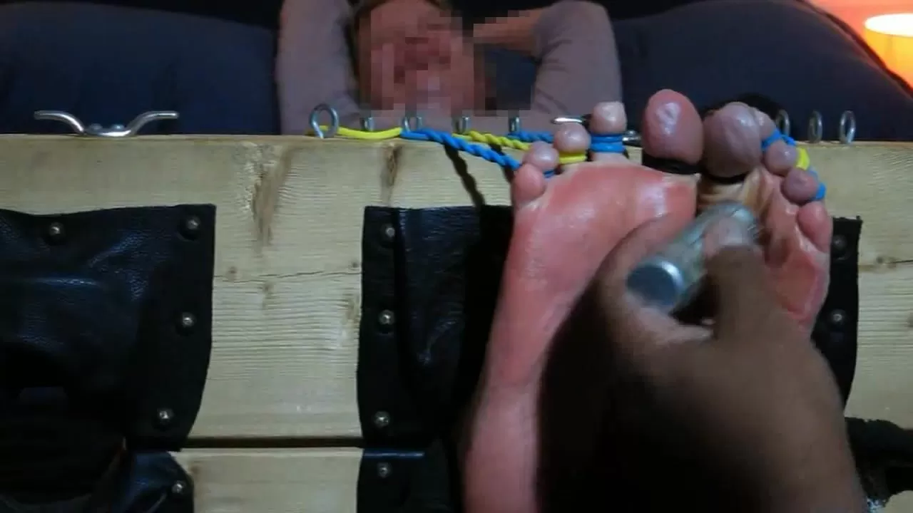 StuckInTheStocks - Samantha's Tiny Toes Tickled!.0000 - 00-00-36.webp