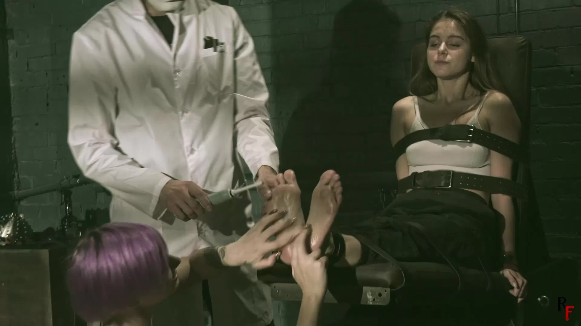 RussianFetish – Psy Helmet 2 – Leya meets Mad Doc and his tickle toy Astrid.00.webp